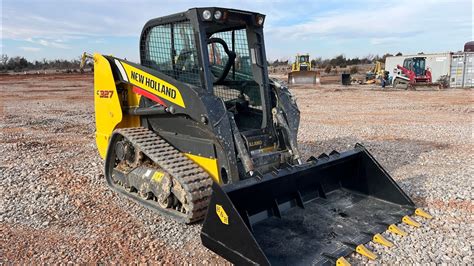 new holland c327 track loader|grapple for new holland loader.